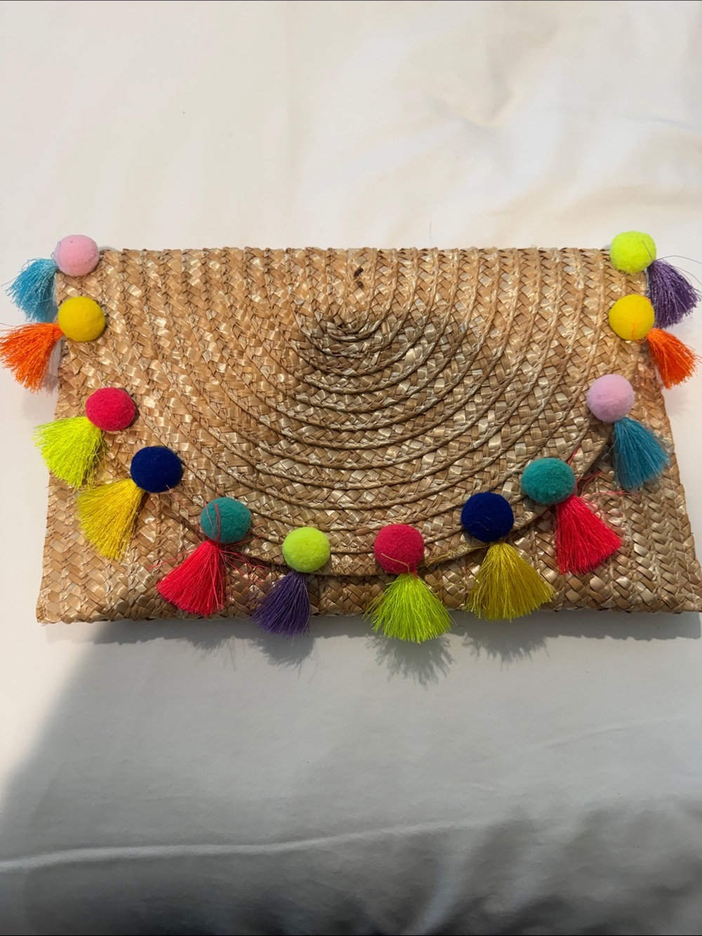 Woven Straw Clutch with Colorful Pom Tassels